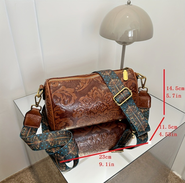 Faux PU Leather Floral Embossed Crossbody Barrel Bag Woven Strap Brown