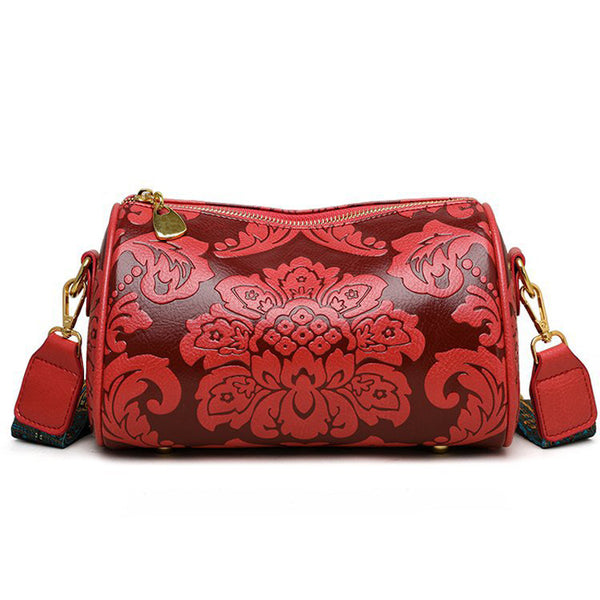 Faux PU Leather Floral Embossed Crossbody Barrel Bag Woven Strap Red