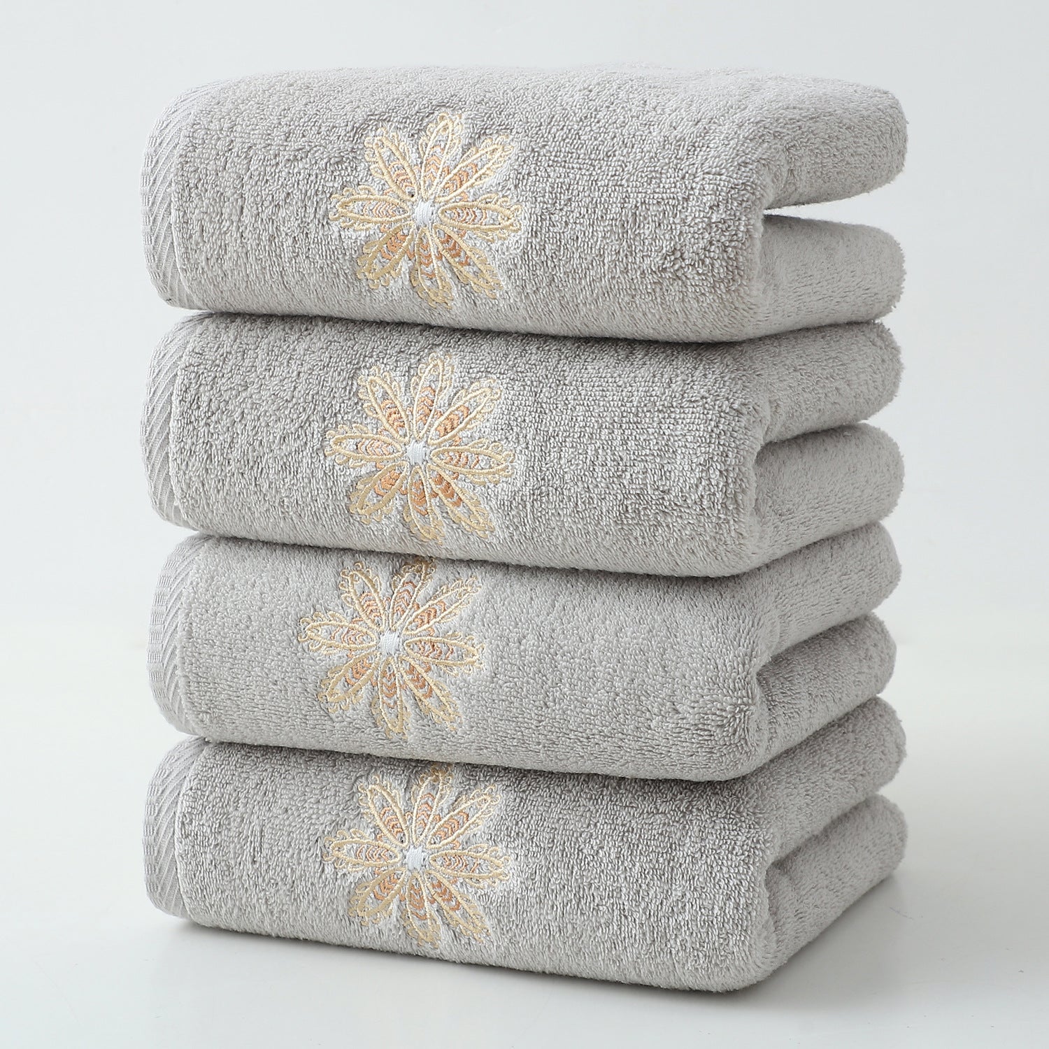 4 x Elegant Gold Floral Embroidered Cotton Hand Towels Grey